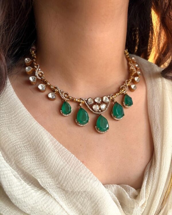 Aarohi Sabyasachi Polki Set with Moissanite stones, pearls, and gold finish – bridal jewelry necklace with matching earrings