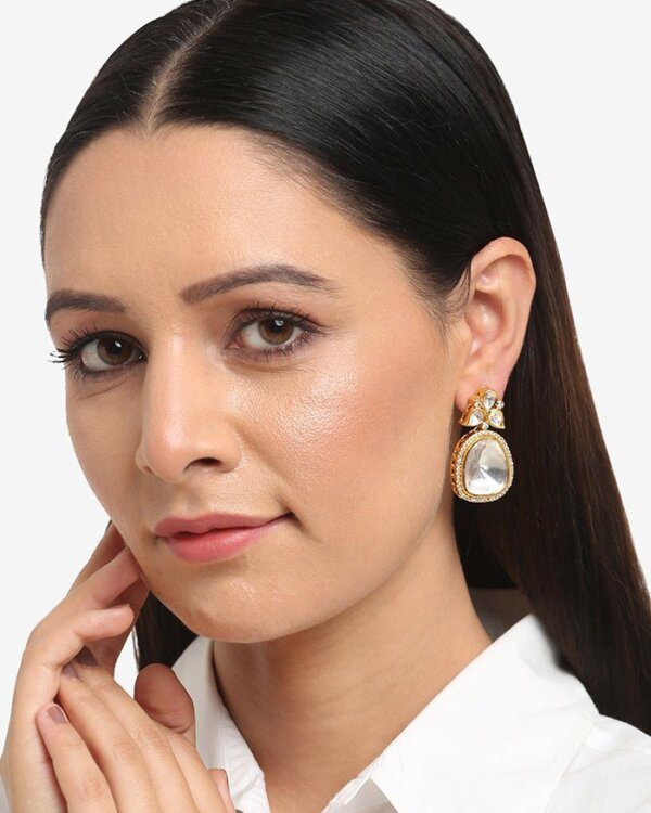 Priya Uncut Polki Studs – elegant handcrafted bridal earrings featuring traditional gold plating and uncut Polki stones, perfect for weddings and festive occasions.