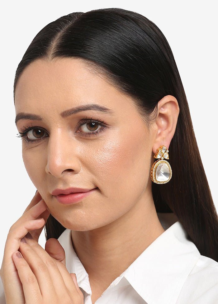 2025/07/1005625895.jpg Priya Uncut Polki Studs – elegant handcrafted bridal earrings featuring traditional gold plating and uncut Polki stones, perfect for weddings and festive occasions.